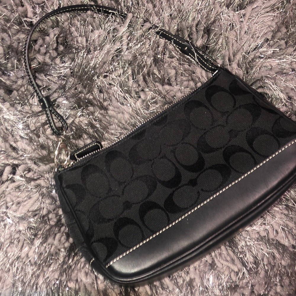 Coach signature hand-bag